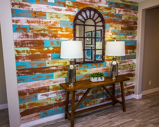 colorful entry hallway wood slat wall